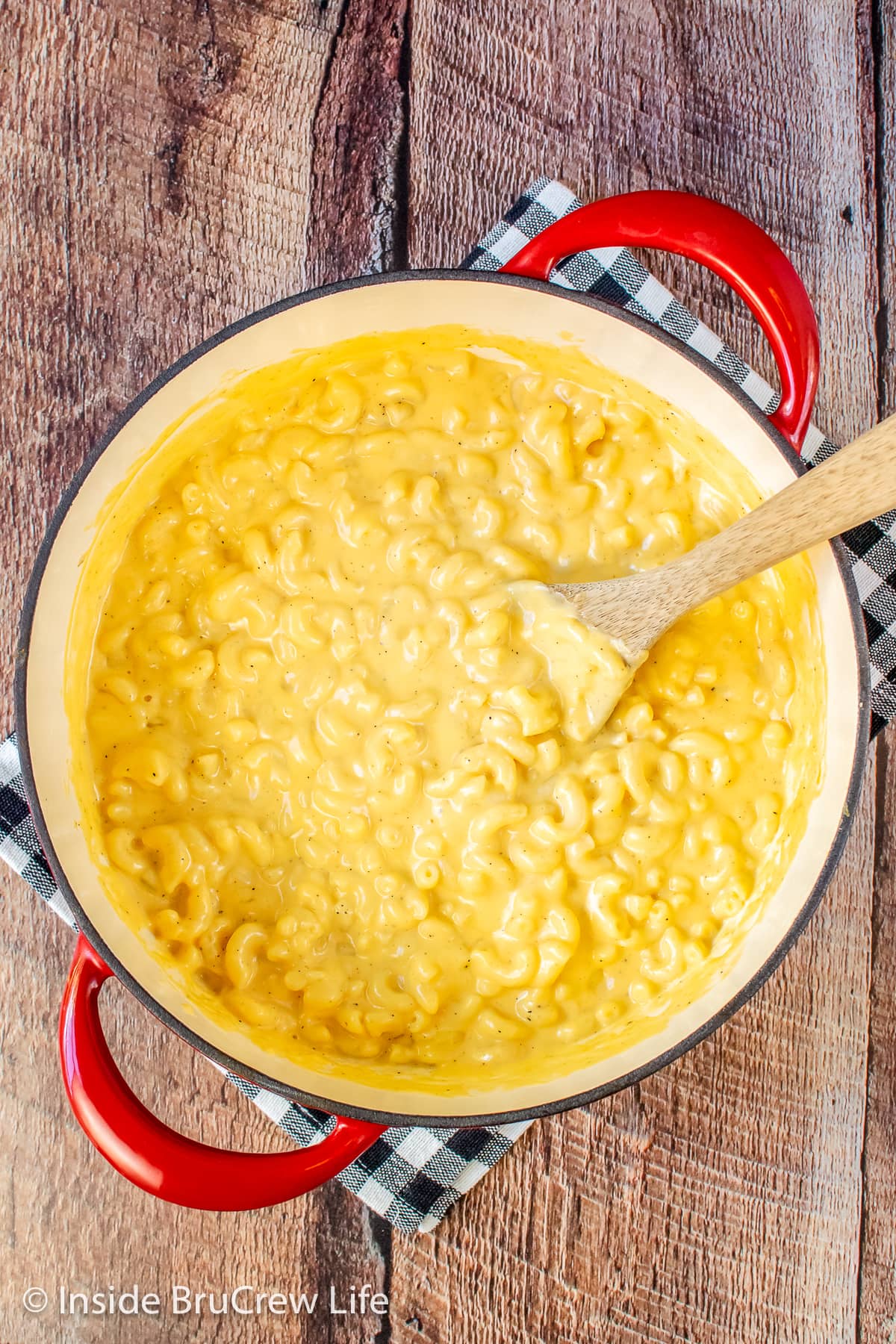 A pot full of creamy cheesy macaroni and cheese.