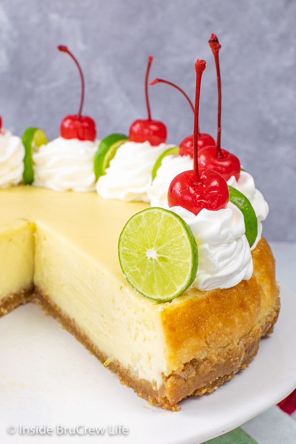 Close up picture of the inside of a key lime cheesecake showing how creamy it is.