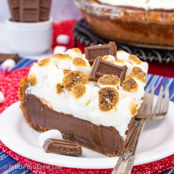 A white plate with a slice of s'mores pie on it.