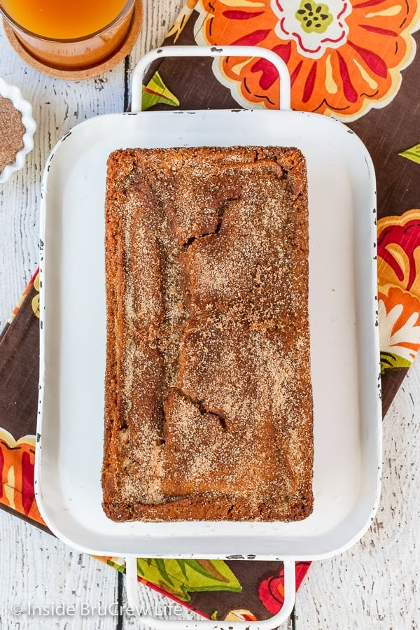 Overhead picture of a loaf of apple bread covered with cinnamon sugar.