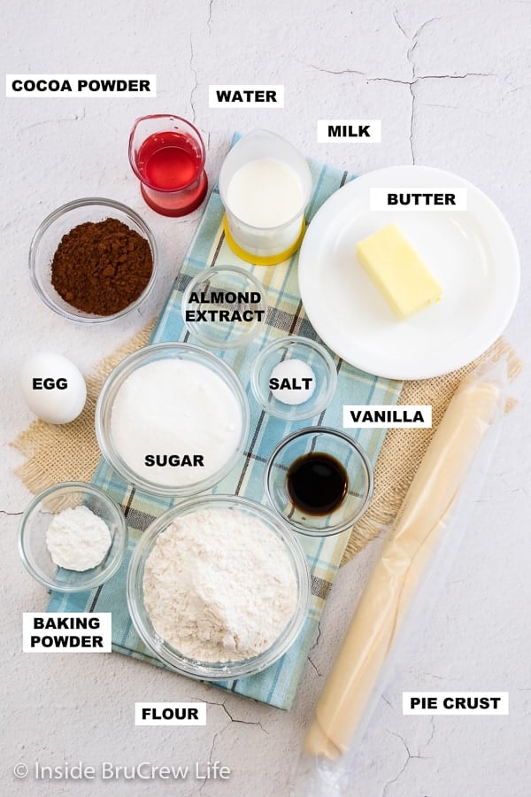 Overhead picture of bowls filled with ingredients needed to make a Funny Cake.