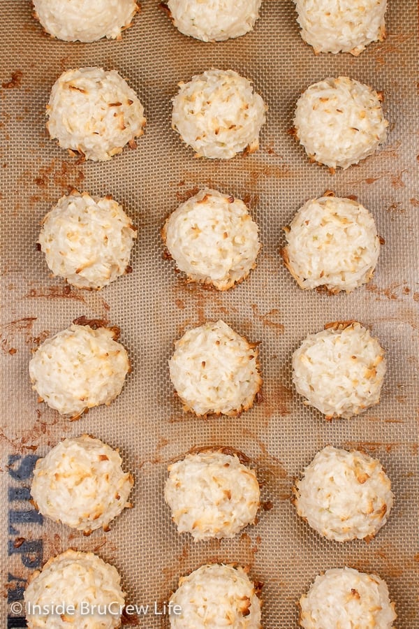 Overhead picture of a tray with baked coconut macaroons on it.