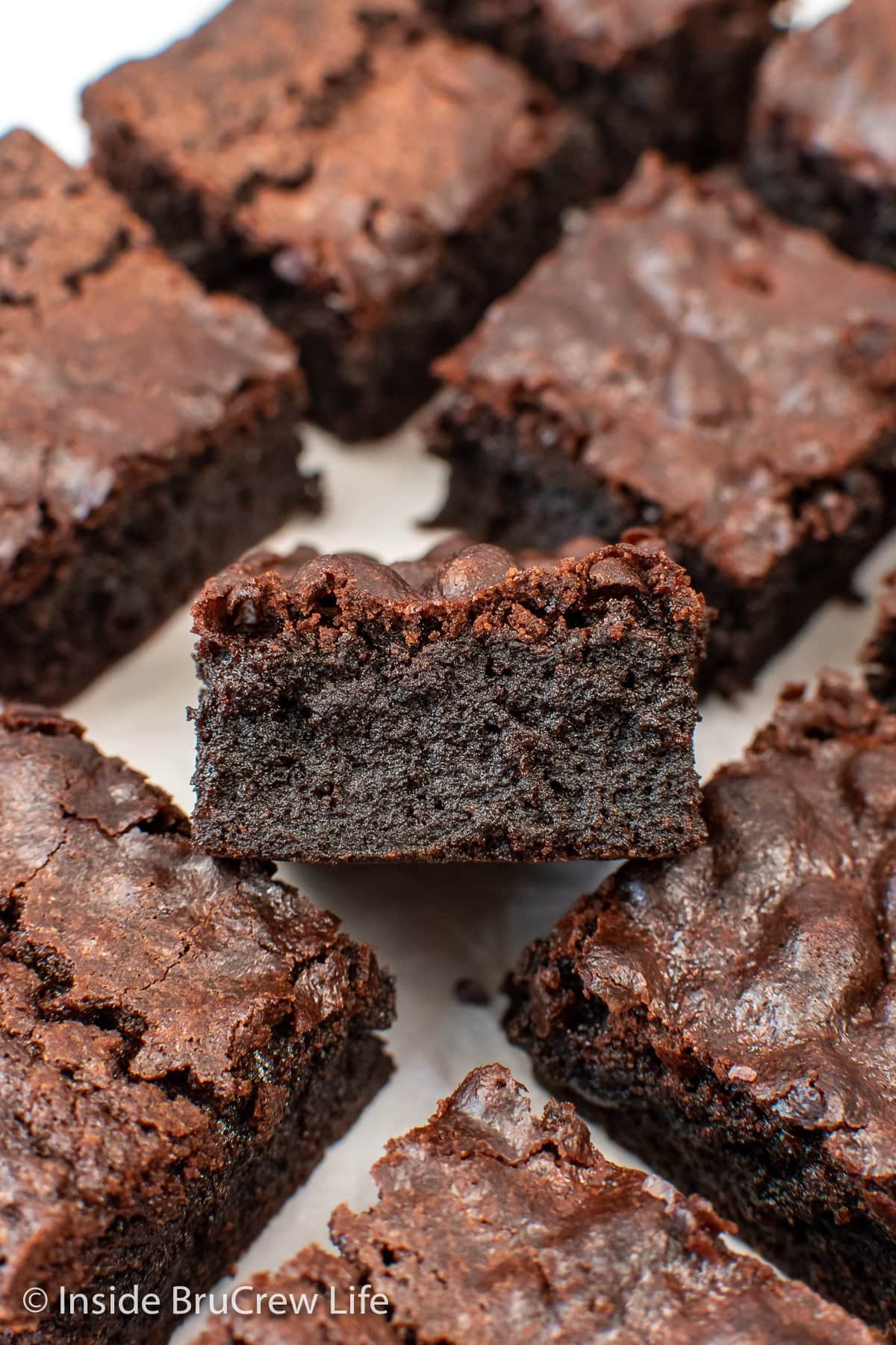 Chocolate brownies on a white background.