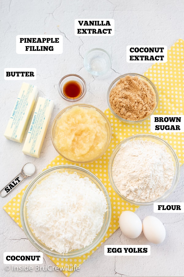 Bowls of ingredients needed to make fruit crumble bars.