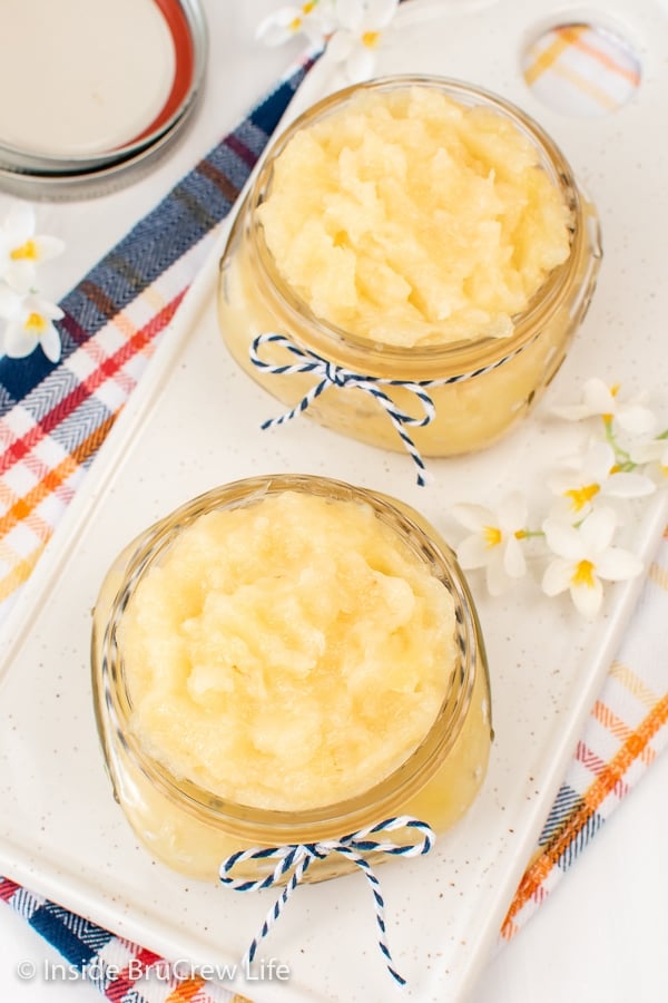 Clear jars with pineapple filling.