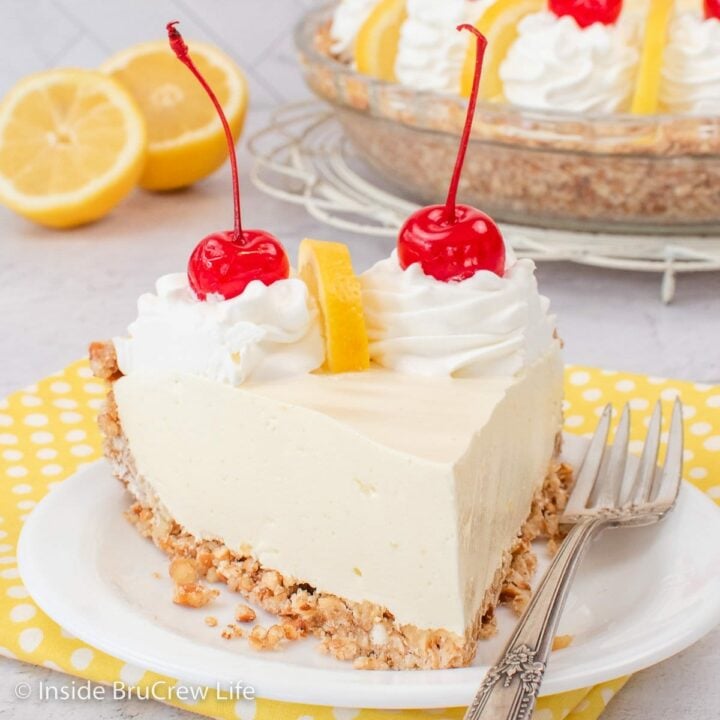 A slice of lemon pie on a white plate.