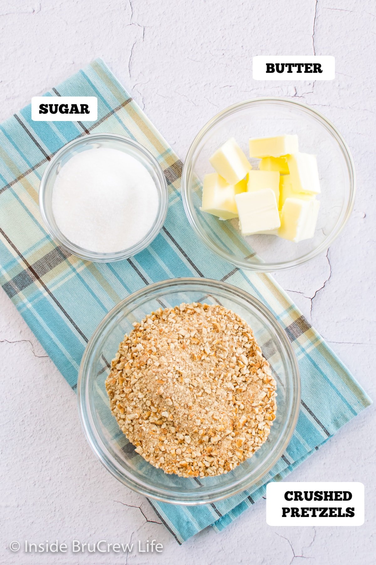 Bowls of ingredients needed to make a sweet and salty pie crust.