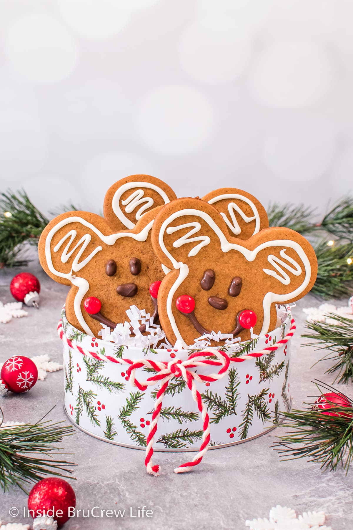 A Christmas tin filled with Mickey Mouse cookies.