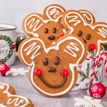 Decorated Gingerbread Mickey Mouse cookies on a table.