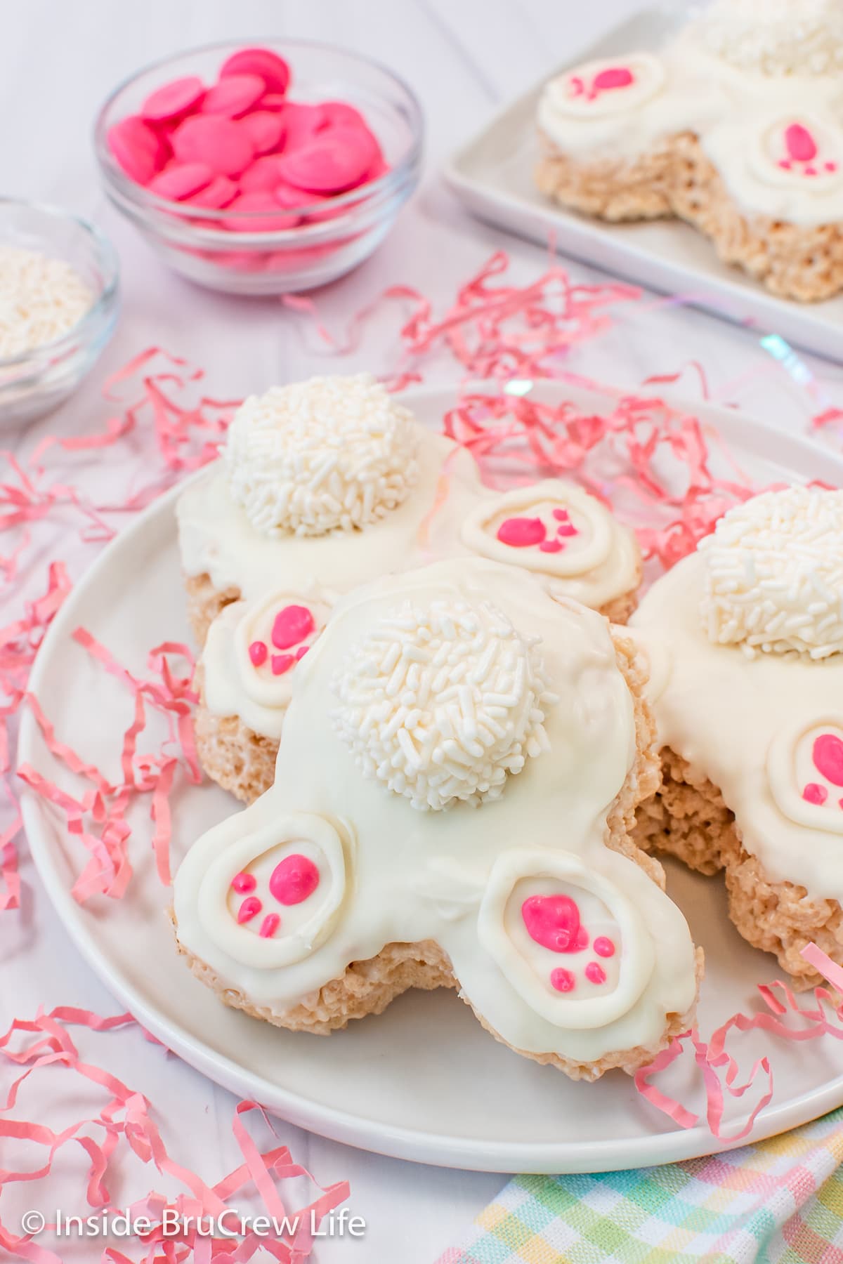 Three Easter bunny treats on a white plate.