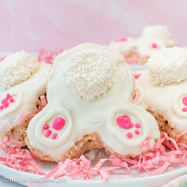 Bunny rice krispie treats decorated with white chocolate so they look like bunny butts.