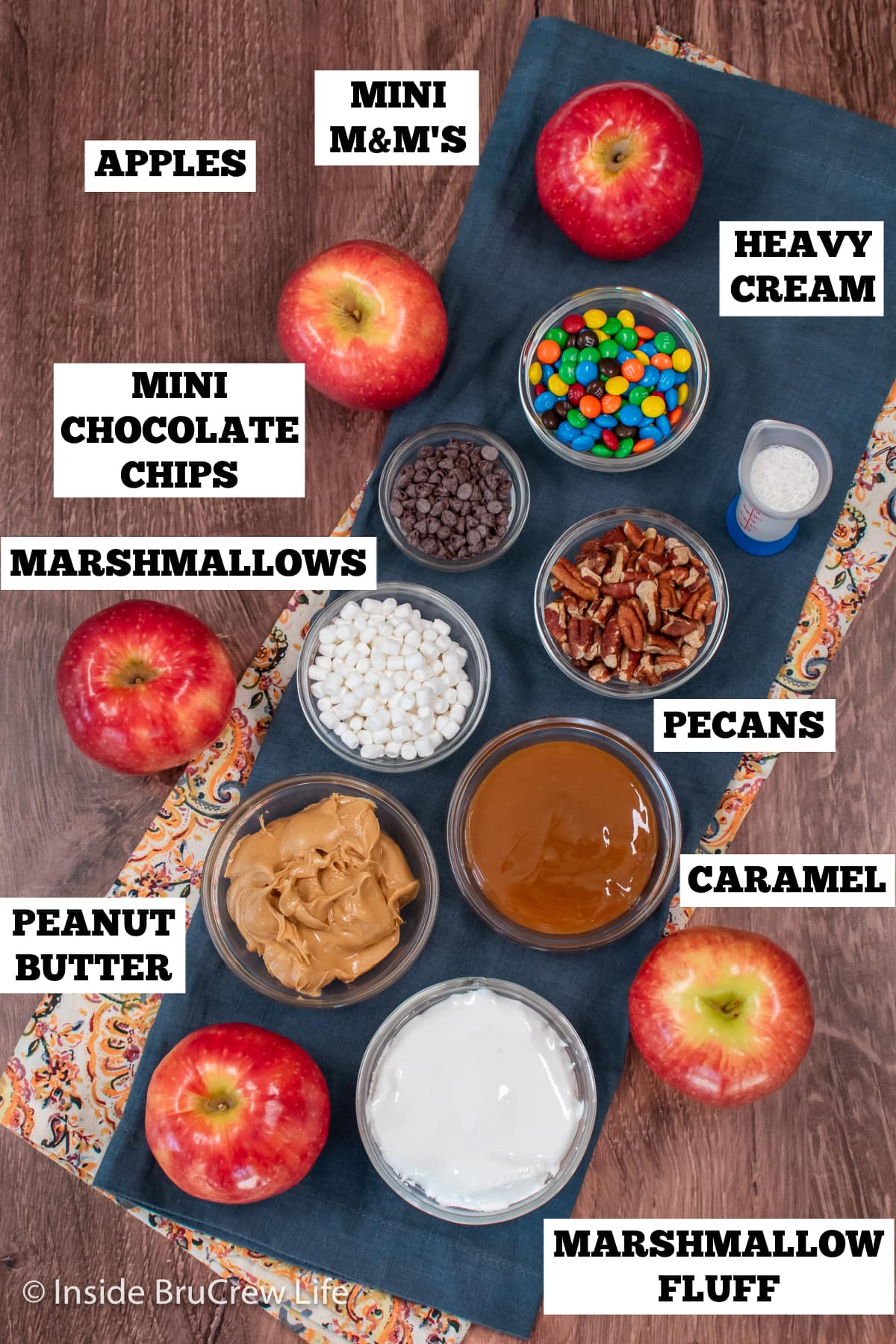 Bowls of topping ingredients needed for apple slices.