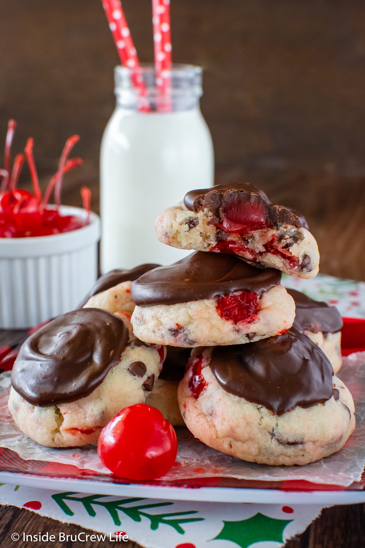 A plate with cookies stacked on it.