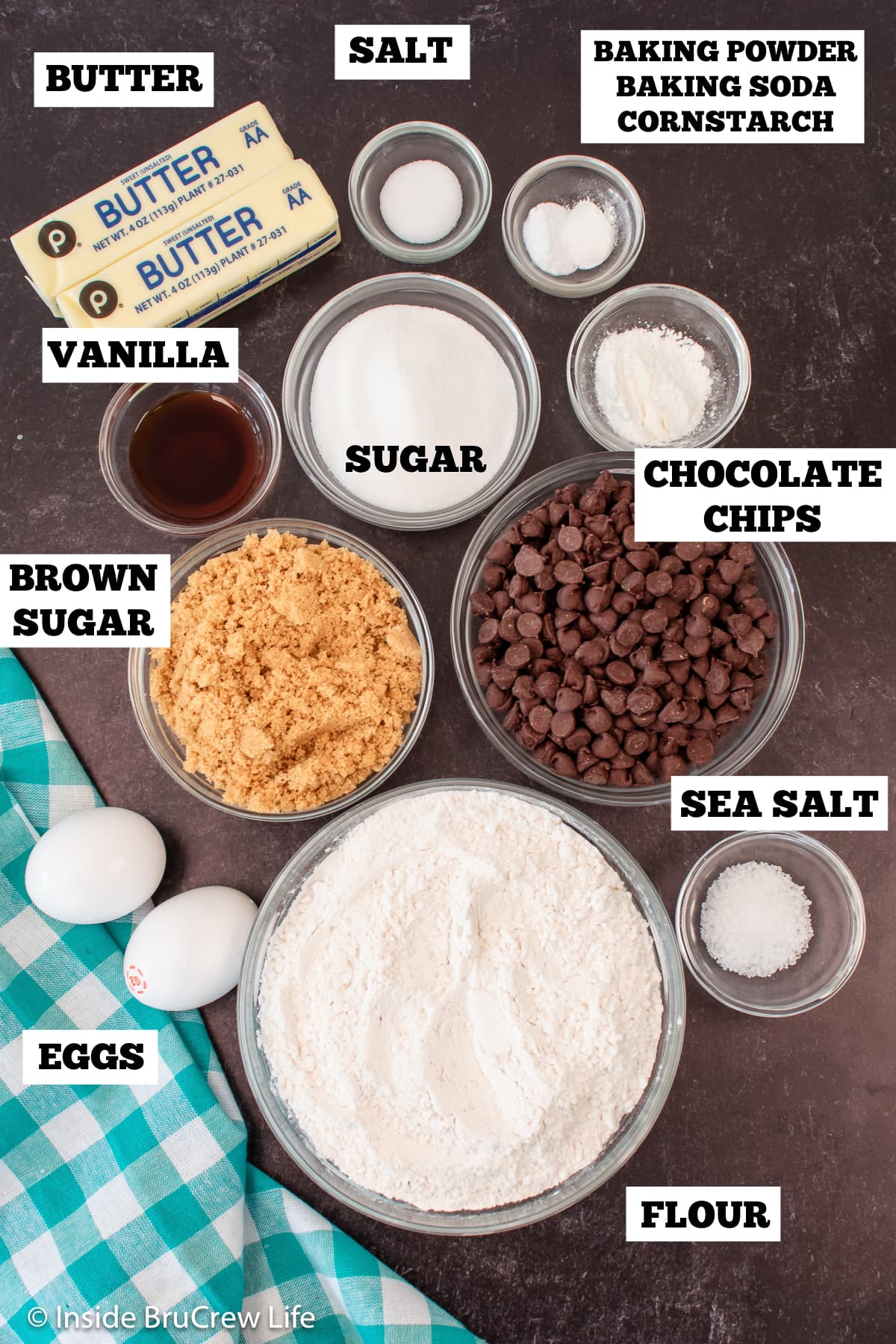 Bowls of ingredients needed to make cookies with chocolate.