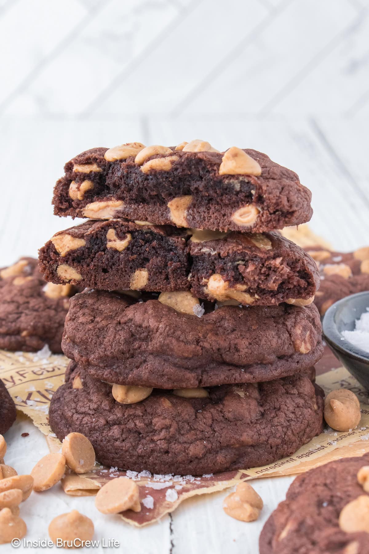 A stack of chocolate cookies with peanut butter chips.