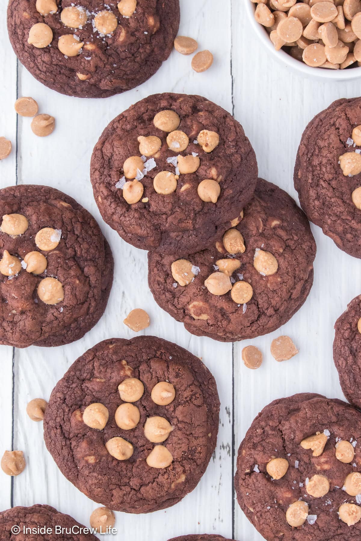 Chocolate peanut butter cookies on a white board.