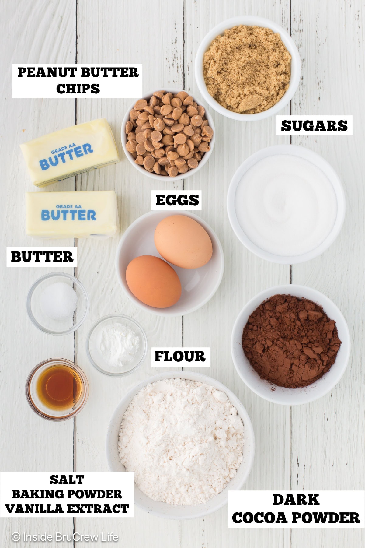 Bowls of ingredients needed to make chocolate cookies.