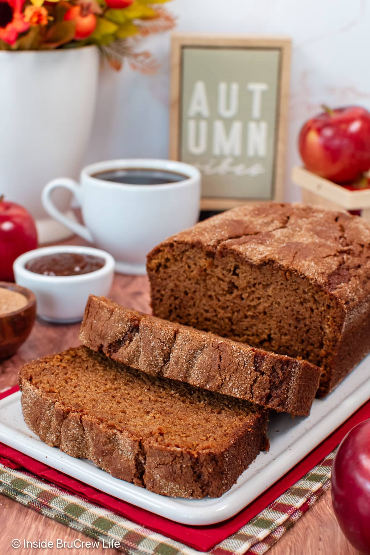 A loaf of fall bread on a white tray.