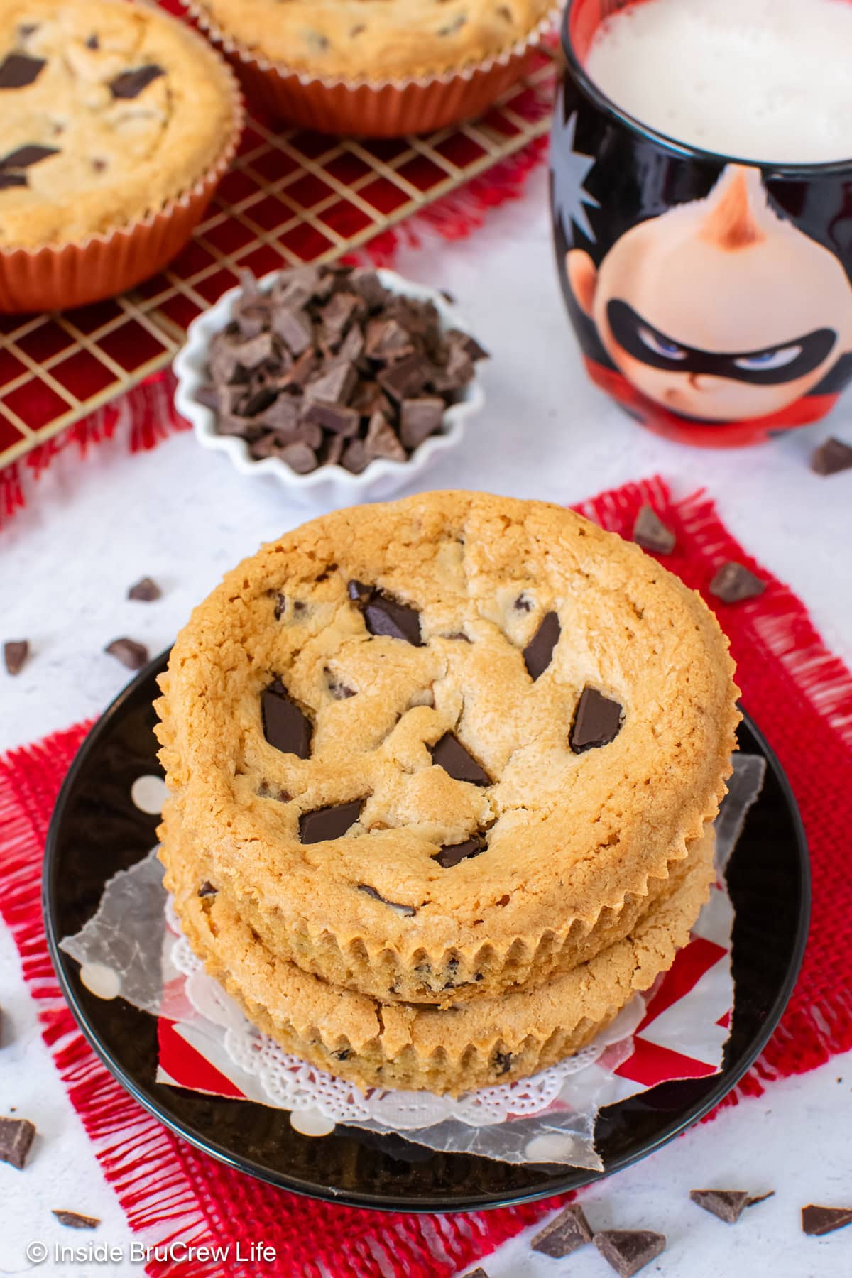 A stack of giant chocolate chip cookies.