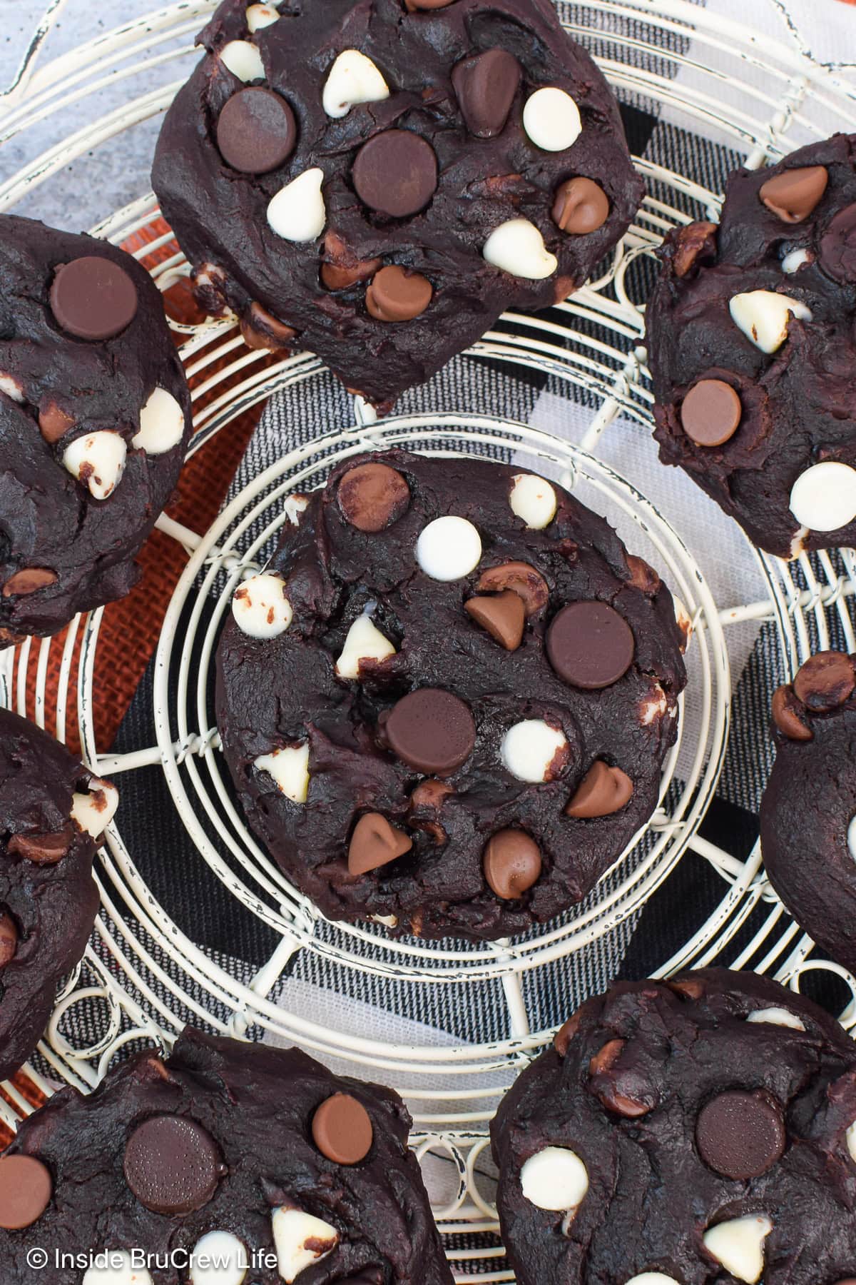 Overhead pictures of chocolate cookies with triple chips.