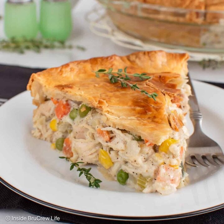 A big slice of easy homemade chicken pot pie on a white plate.
