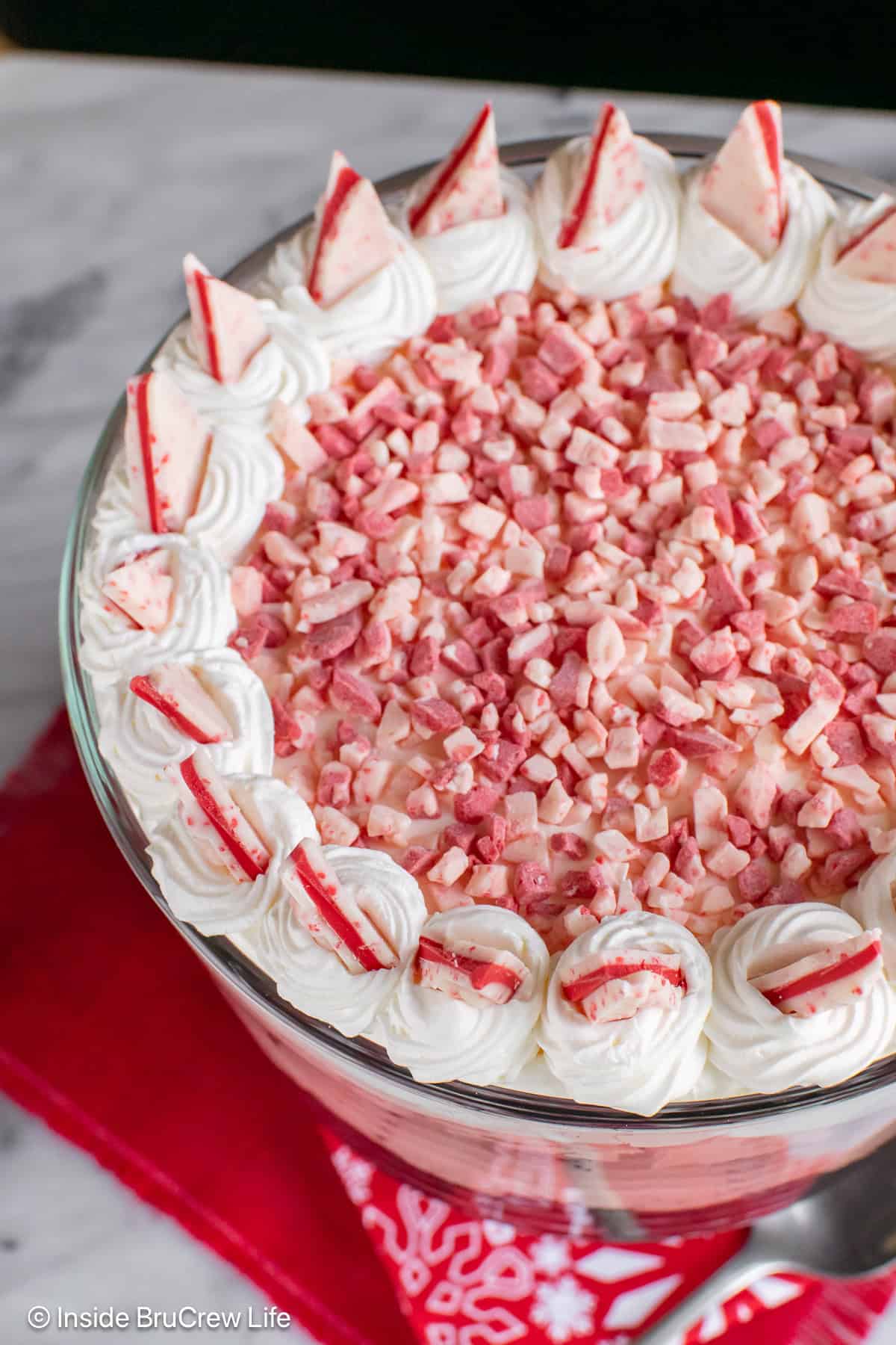 The top of a brownie peppermint trifle dessert topped with Andes peppermint crunch bits.