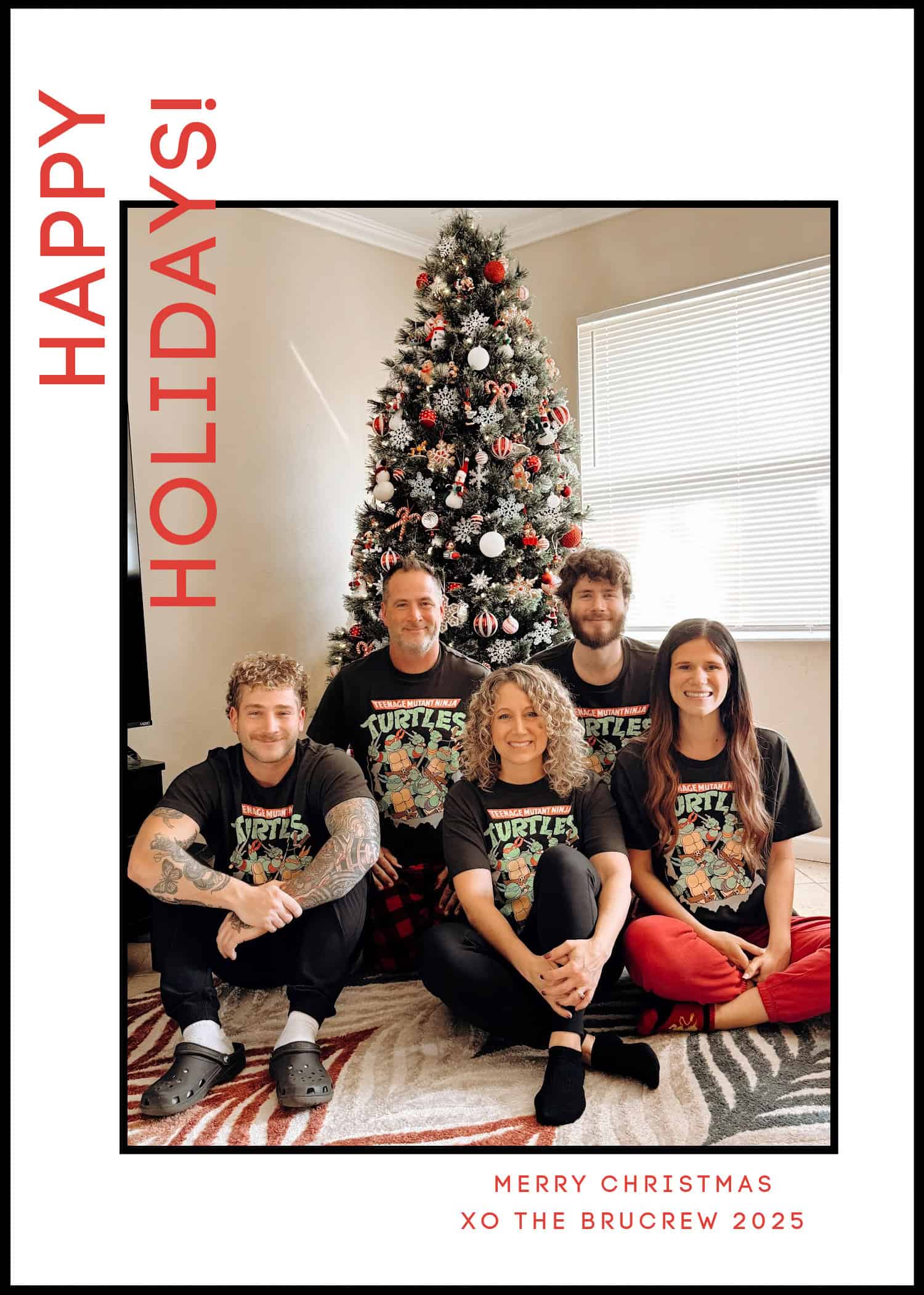 Holiday Christmas card with our family in front of the tree.