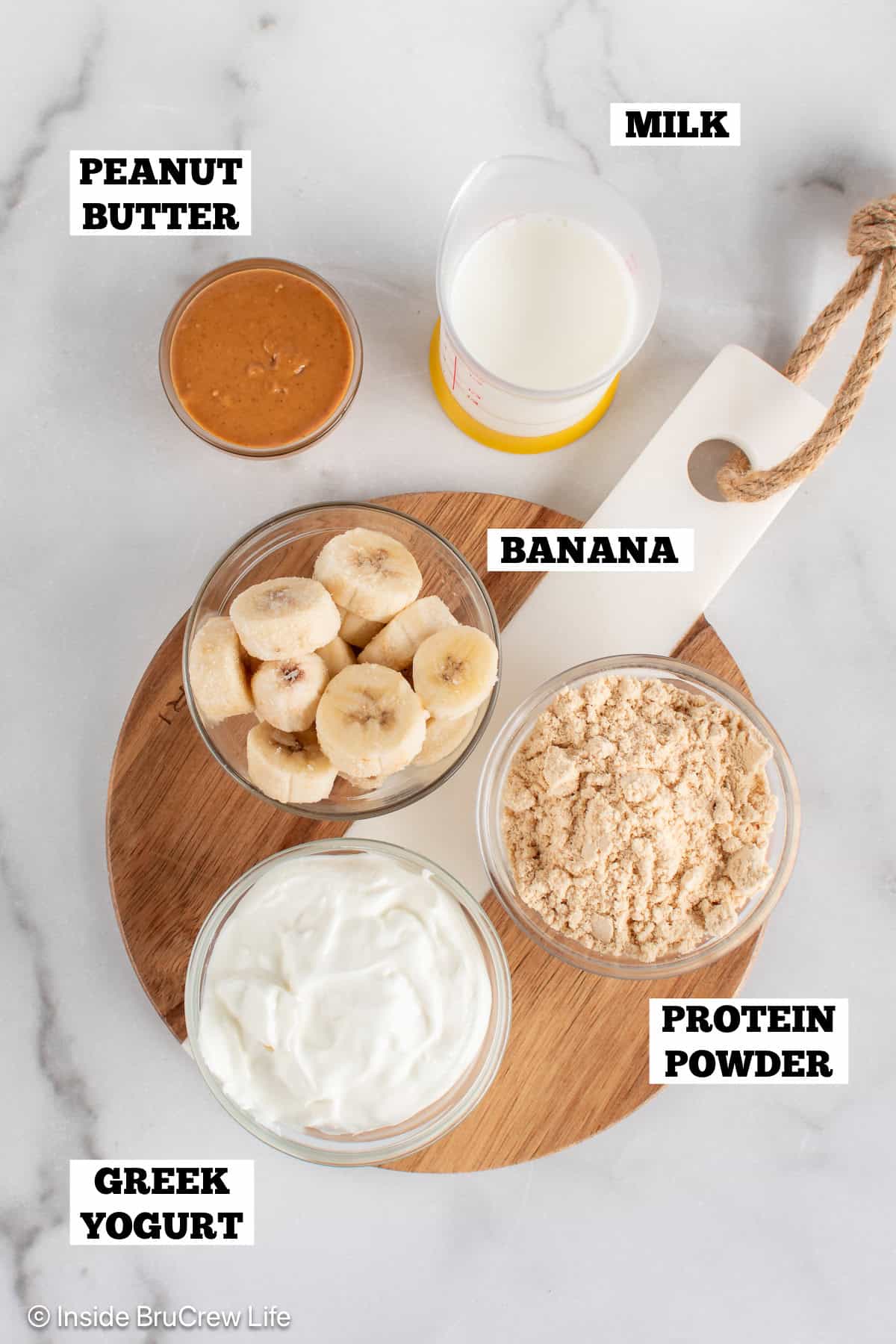 Peanut butter banana smoothie ingredients with text labels.